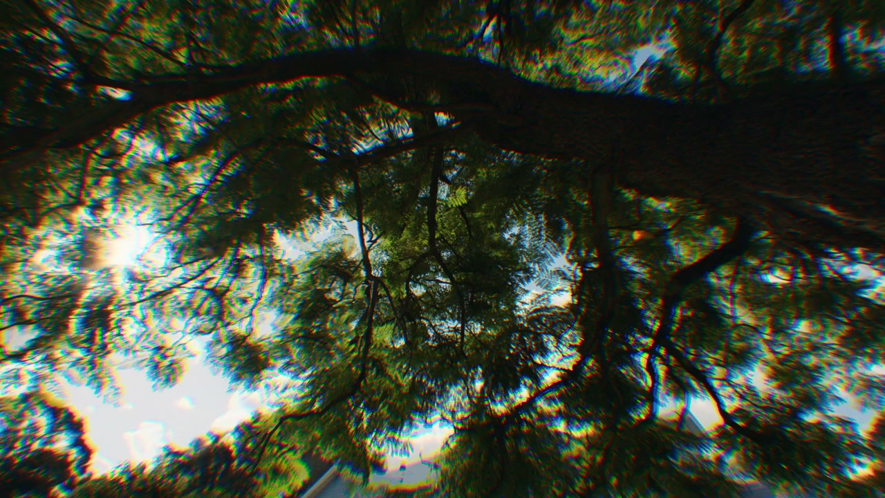 Footage with chromatic aberration applied, the color channels splitting more strongly toward the edges of the frame